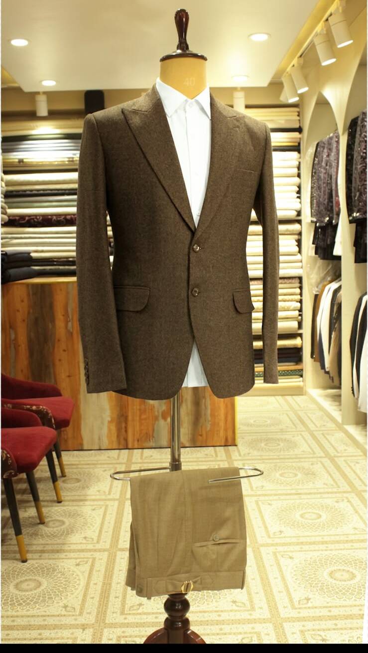 Bespoke tailoring atelier with cloth bolts